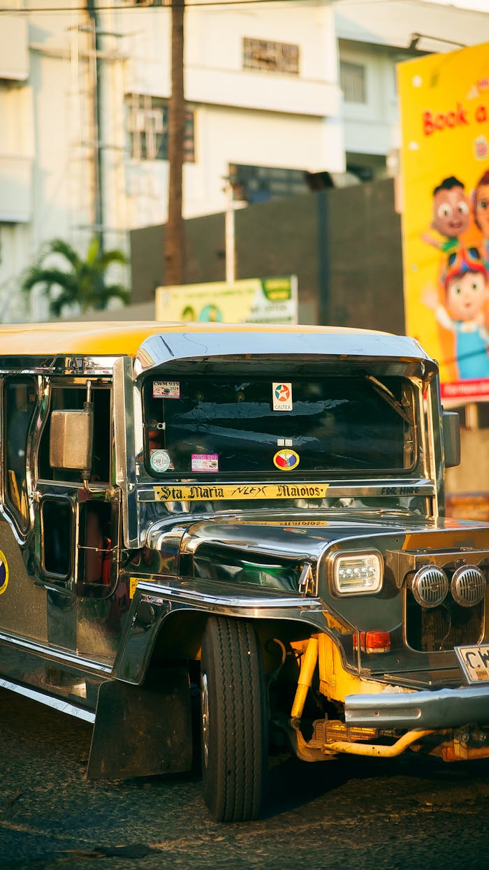 A vibrant jeepney parked on a sunny street in the Philippines, showcasing local culture.
